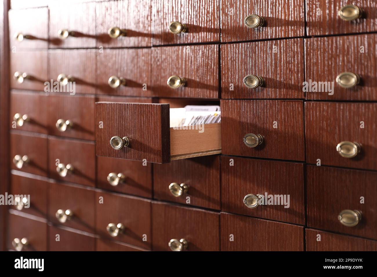 Open wooden drawer with index cards of library catalog Stock Photo Alamy