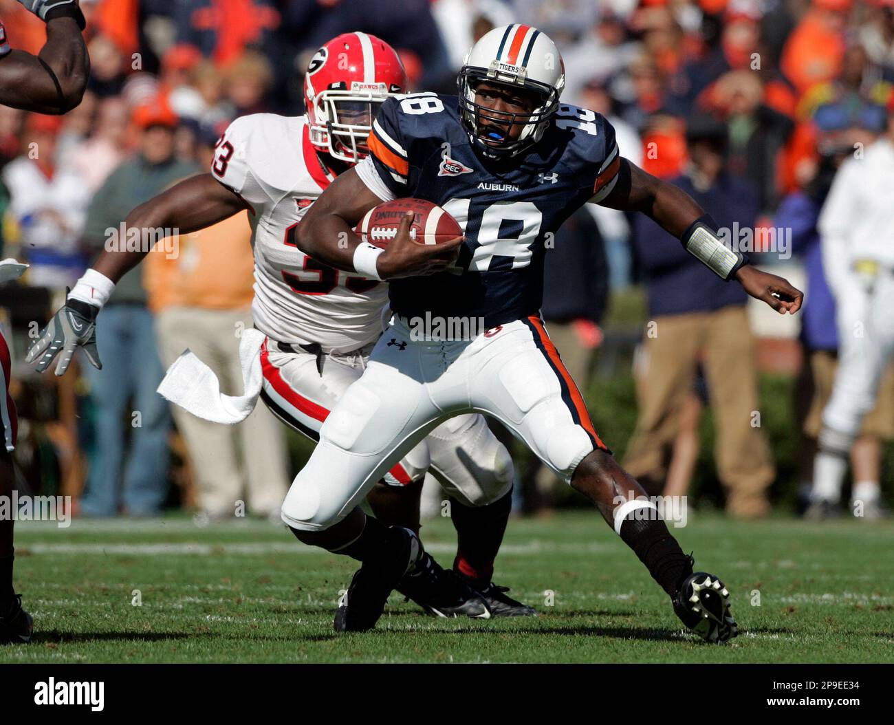 Auburn quarterback Kodi Burns (18) scrambles as Dannell