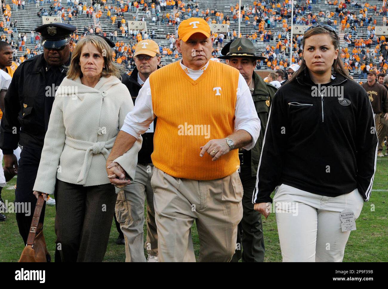Tennessee coach Phillip Fulmer, center, leaves the field with this wife Vicky, left, and daughter Allison after an NCAA college football game against Wyoming Saturday, Nov. 8, 2008 in Knoxville, Tenn. Wyoming