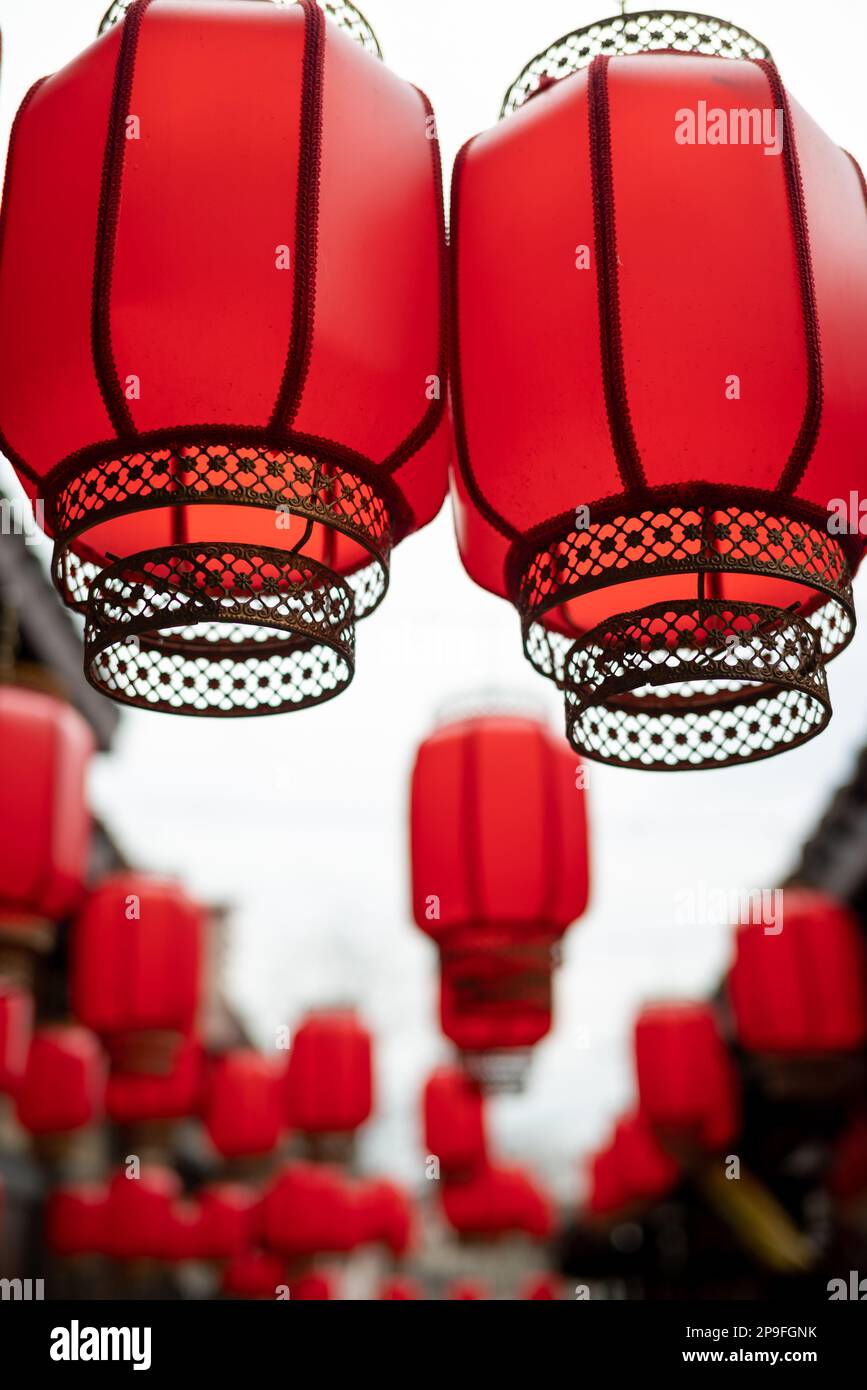 Red Chinese lanterns hanging in a street Stock Photo - Alamy