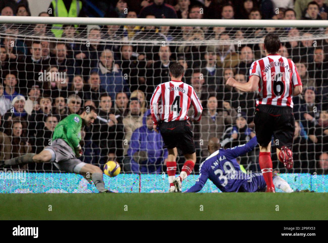 Chelsea's Nicolas Anelka, second right no. 39, shoots to score his