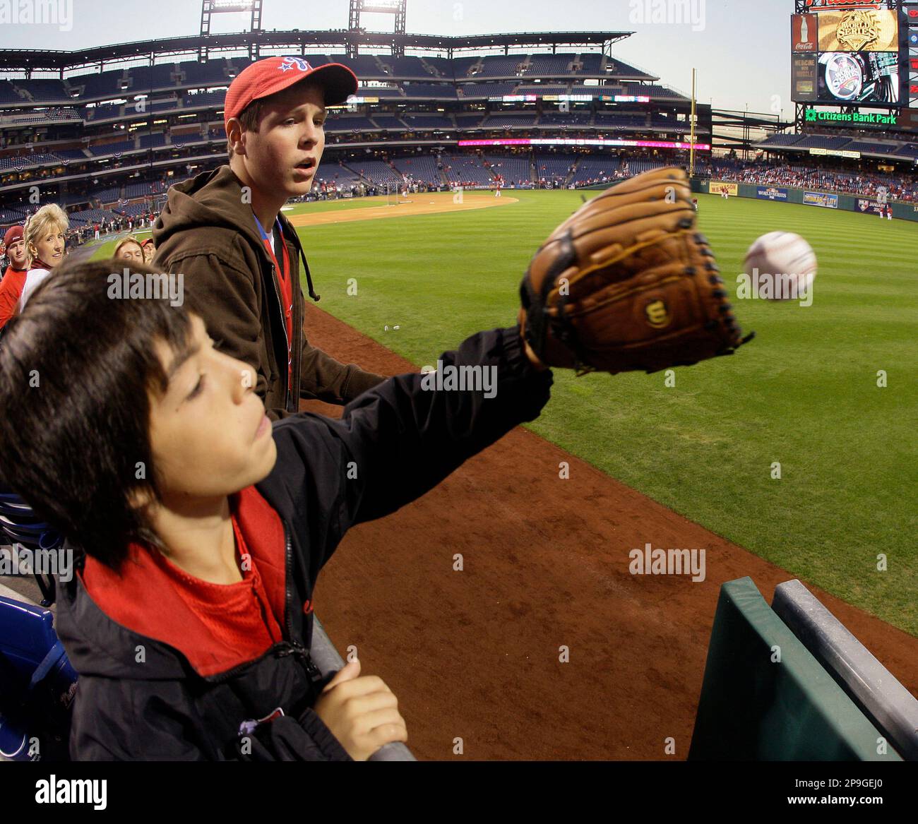 St. Petersburg, FL USA: Tampa Bay Rays outfielder Estanli Castillo (70)  throws a ball to a fan during a spring training baseball game against the  Philadelphia Phillies, Wednesday, April 6, 2022, at