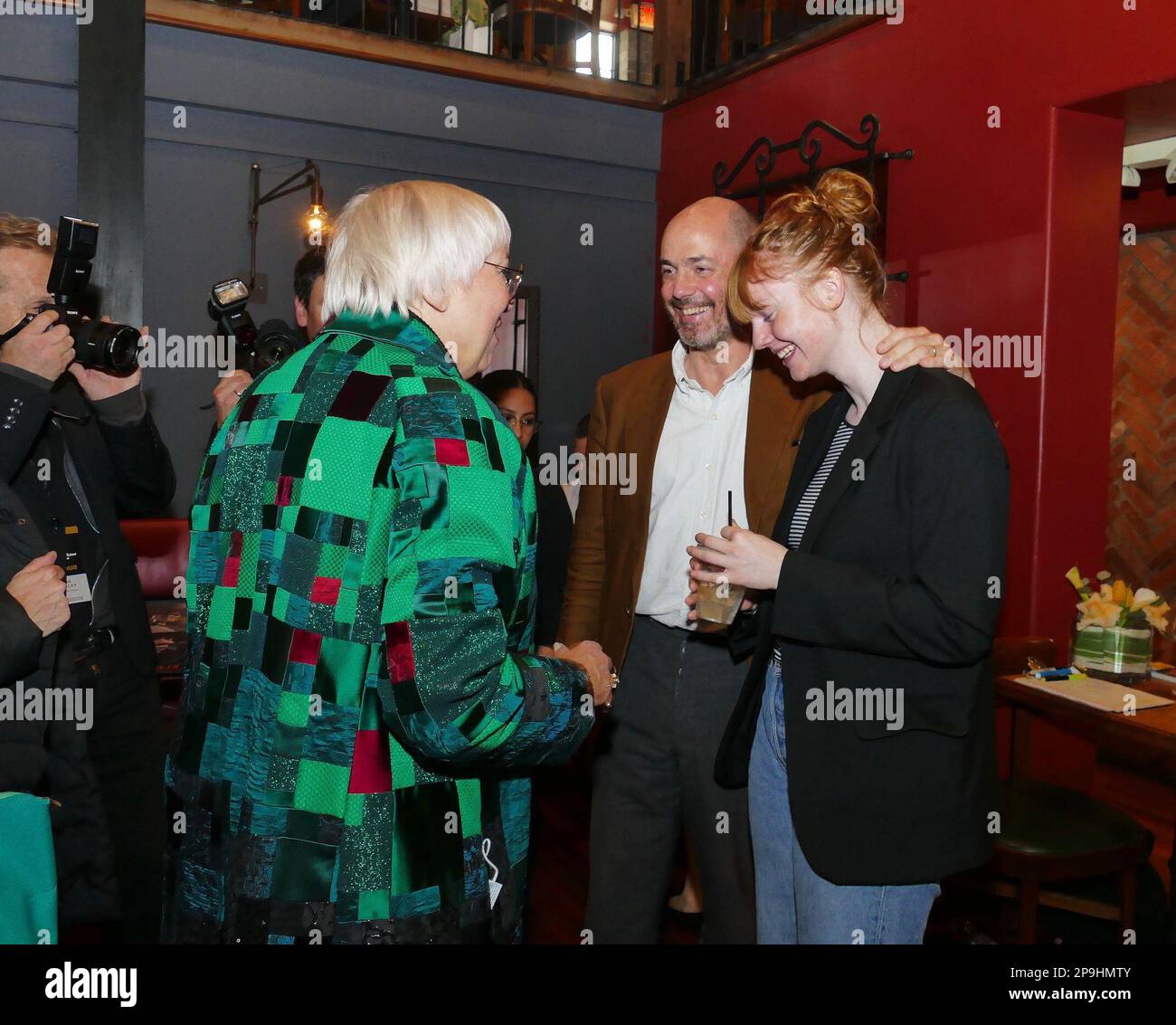 Los Angeles, USA. 10th Mar, 2023. Edward Berger (2nd from right) and his daughter Matilda (r) speak with Claudia Roth, Minister of State for Culture, at a reception for the German Oscar nominees hosted by German Films, the foreign representative of German film. Credit: Barbara Munker/dpa/Alamy Live News Stock Photo