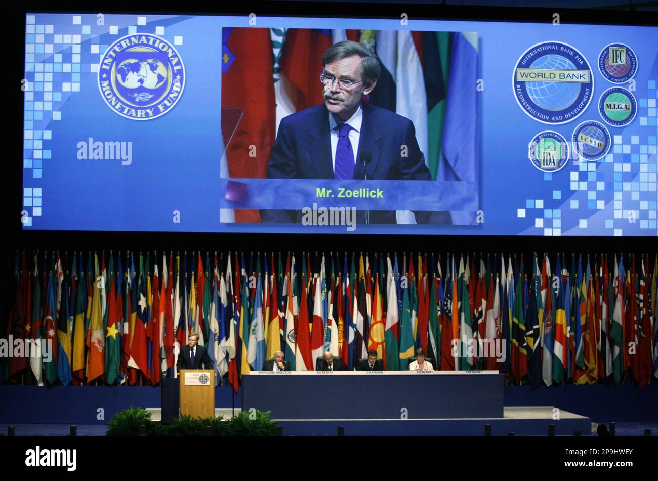 World Bank President Robert B. Zoellick speaks as from left, IMF