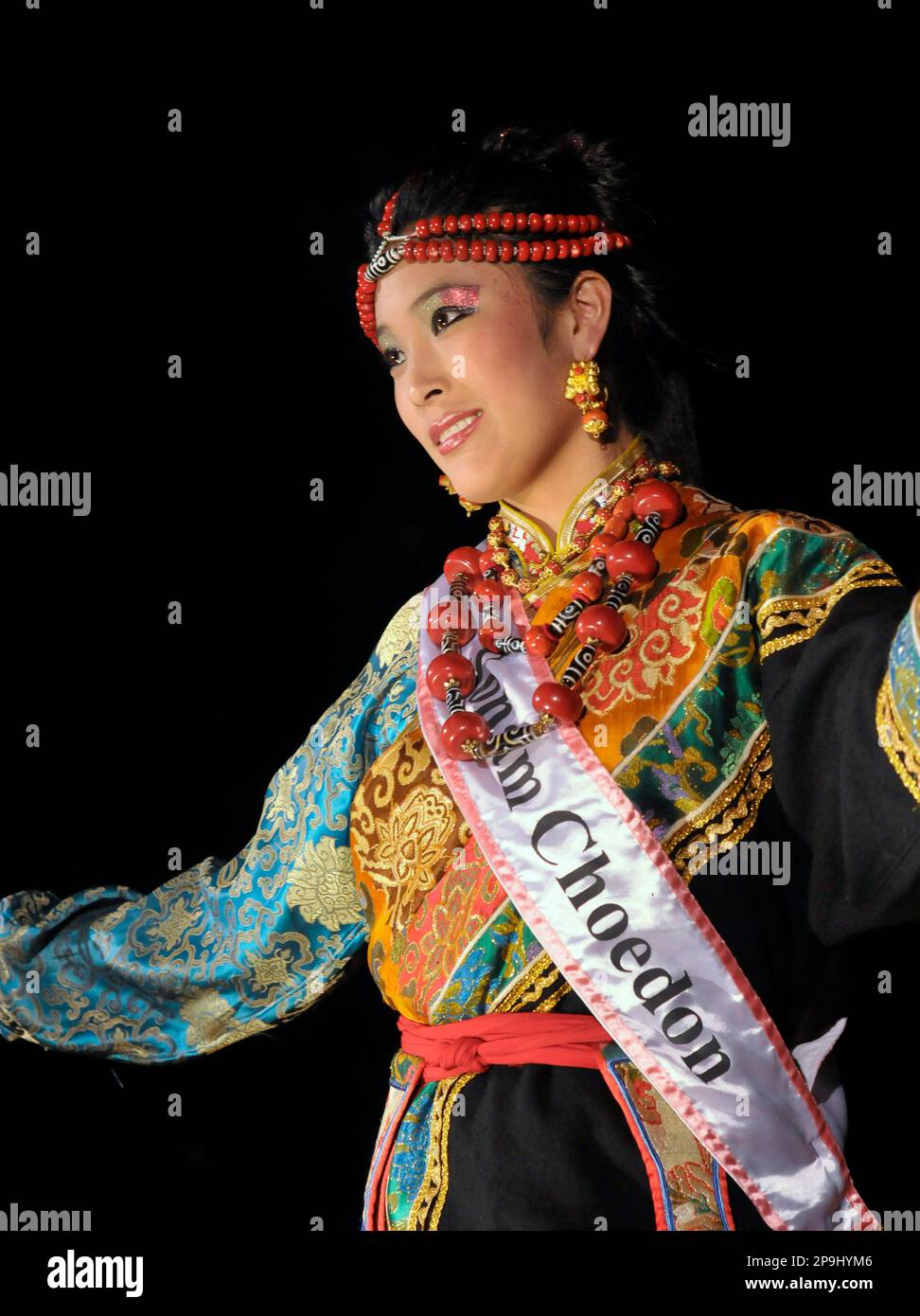 Sonam Choedon, 25, winner of the Miss Tibet 2008 beauty pageant, is seen in Dharmsala, India, Sunday, Oct. 12, 2008. Choedon, who was born in Tibet and came into exile in India in 2007, was one of the two contestants for this year's pageant. (AP Photo/Ashwini Bhatia) Stock Photo