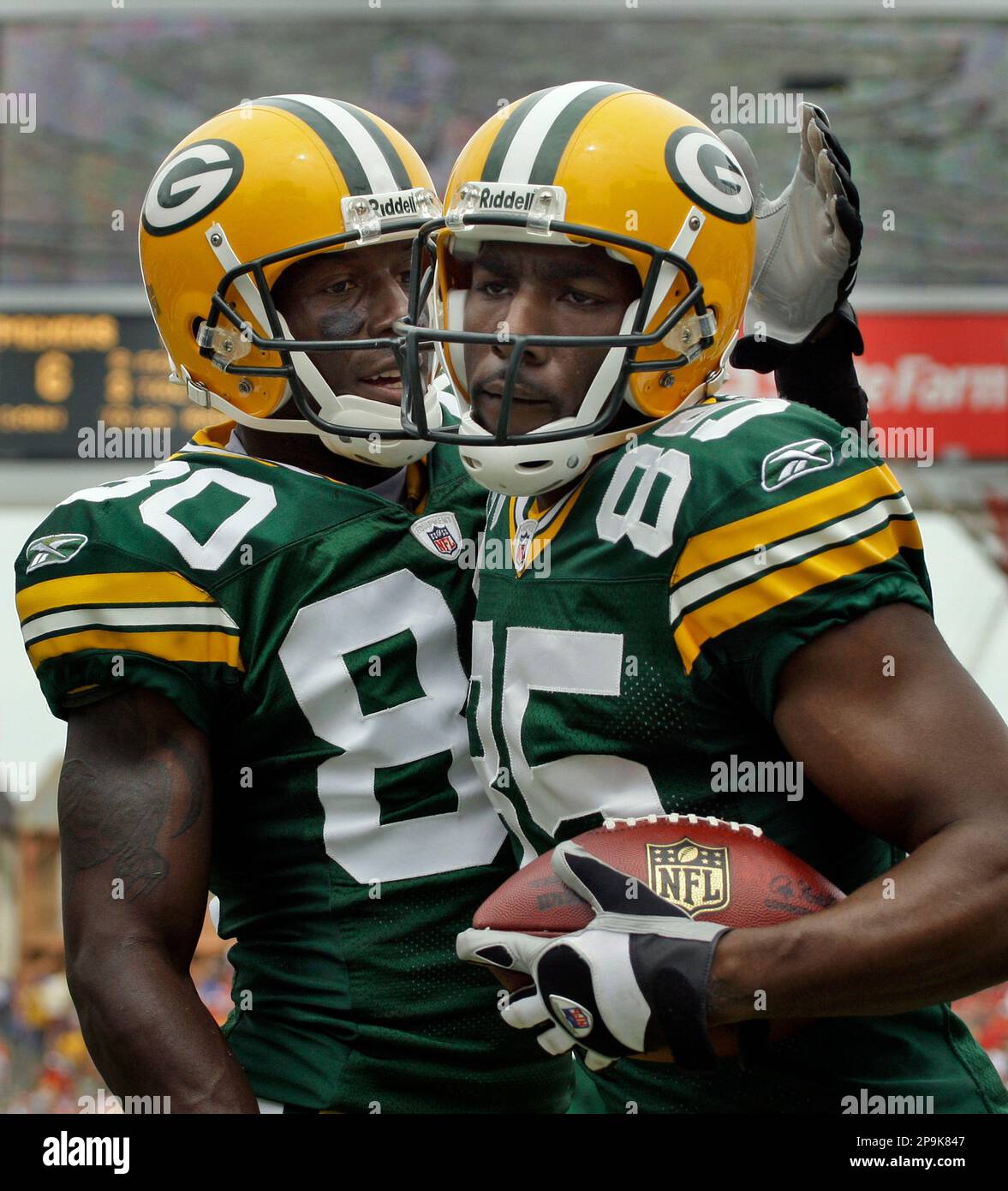 Gree Bay Packers wide receiver Greg Jennings (85) celebrates with teammate  Donald Driver after catching a first-quarter touchdown pass against the  Tampa Bay Buccaneers during an NFL football game, Sunday, Sept. 28,
