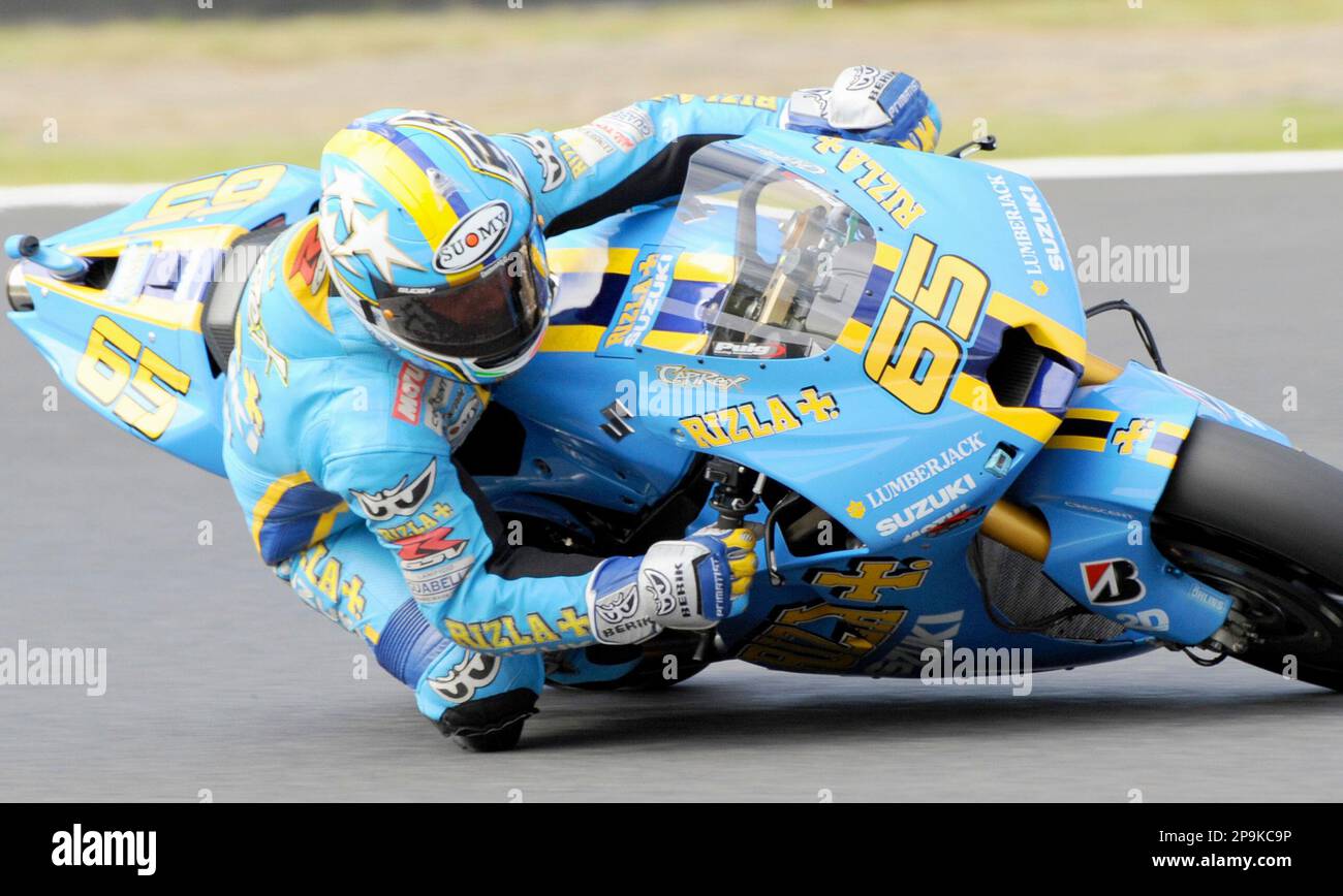 Italian MotoGP rider Loris Capirossi controls his Suzuki