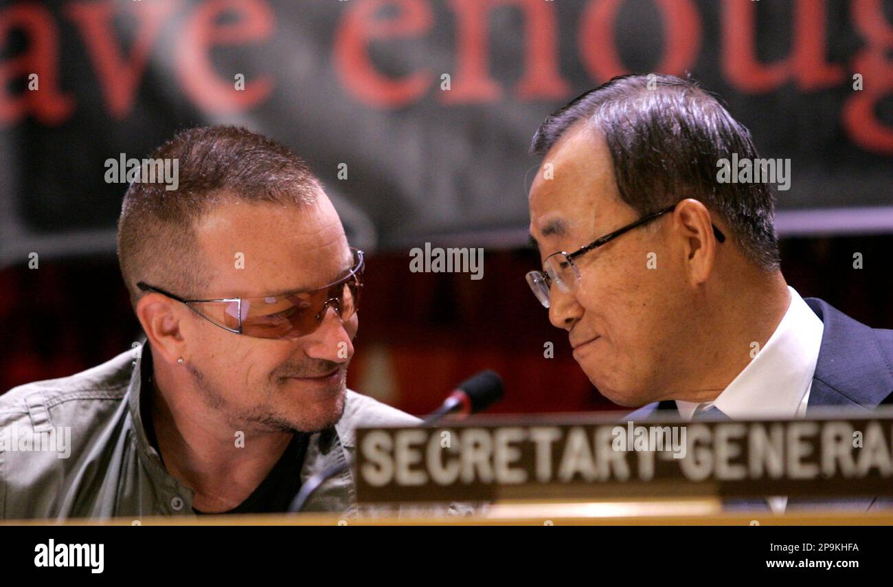 Musician Bono, left, speaks with Secretary General Ban Ki-moon during the launch of the Irish hunger commission report at UN headquarters, Thursday, Sept. 25, 2008. (AP Photo/Frank Franklin II) Stock Photo