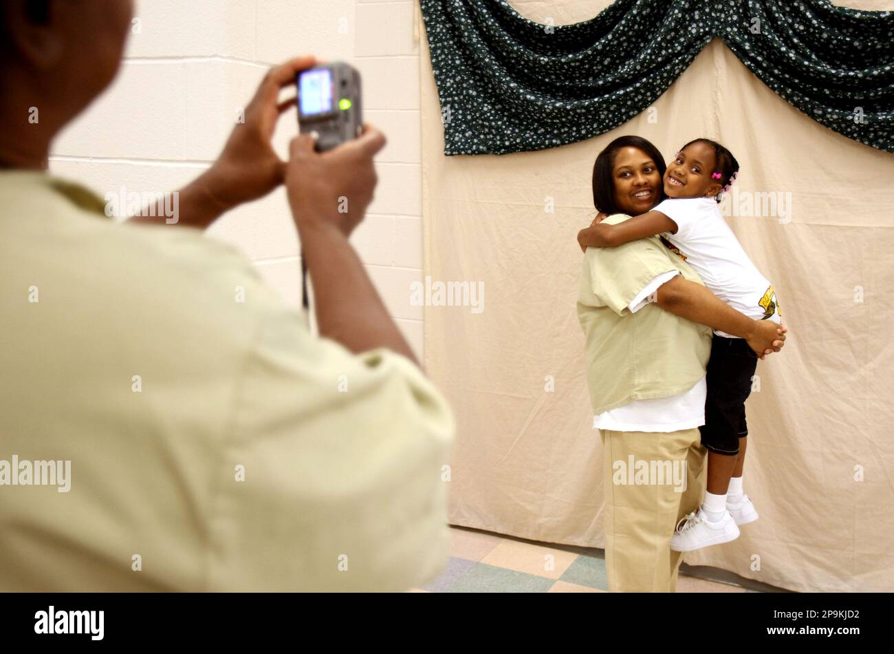 Belinda Williams, left, takes a photo of Melissa Walker and her