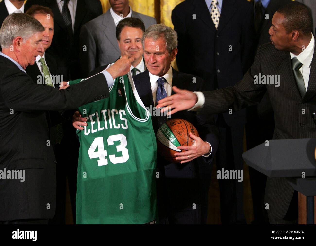 President Bush receives a Boston Celtics jersey and basketball