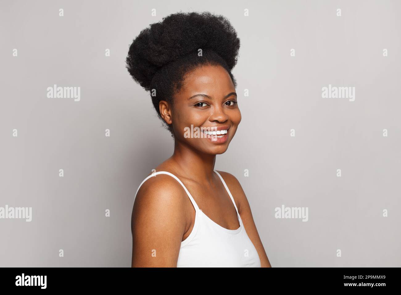 Happy woman laughing on white background Stock Photo - Alamy