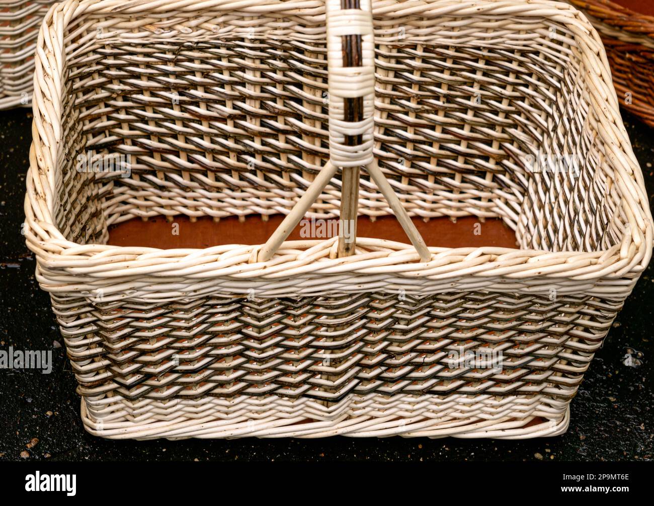 Unusual wicker basket made of natural material closeup at the fair