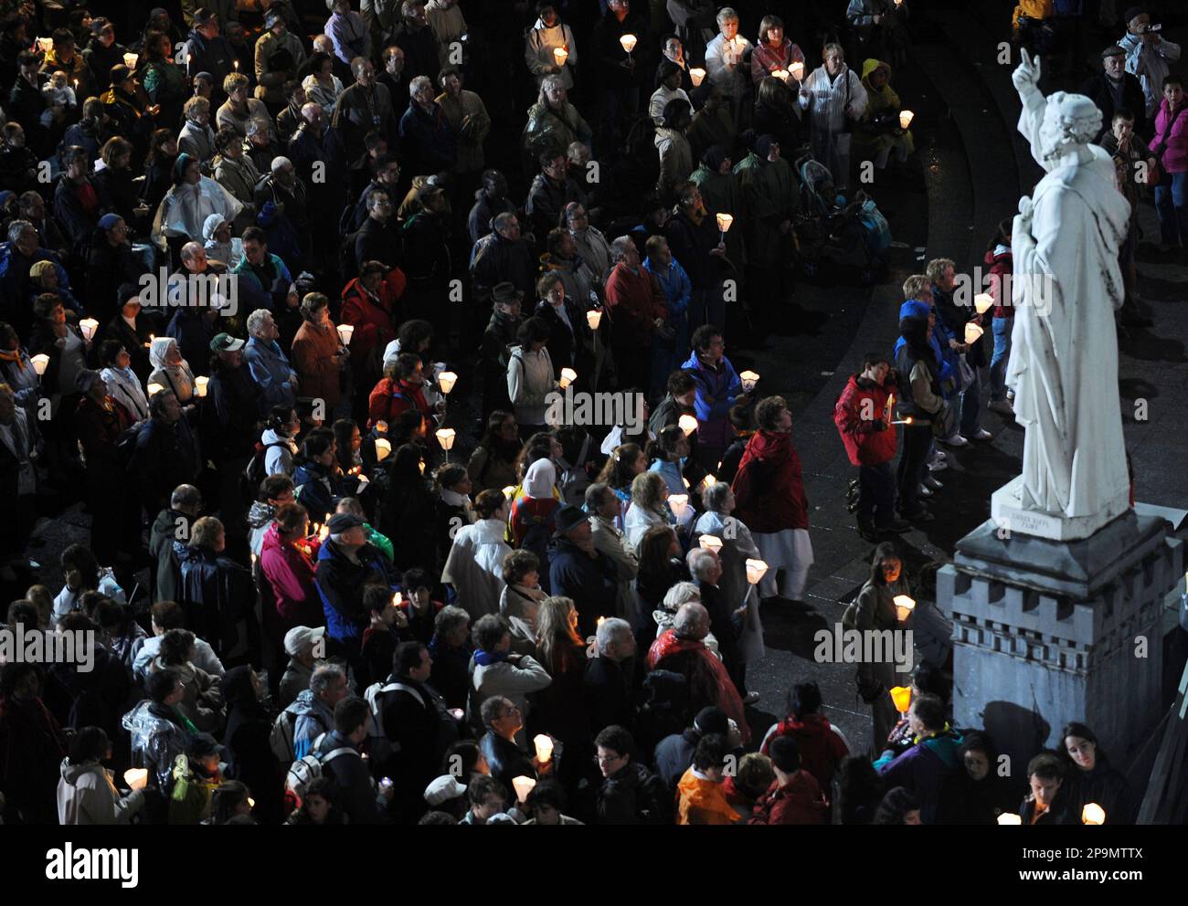 Faithful walk during the Marian Procession of Light at the Rosary