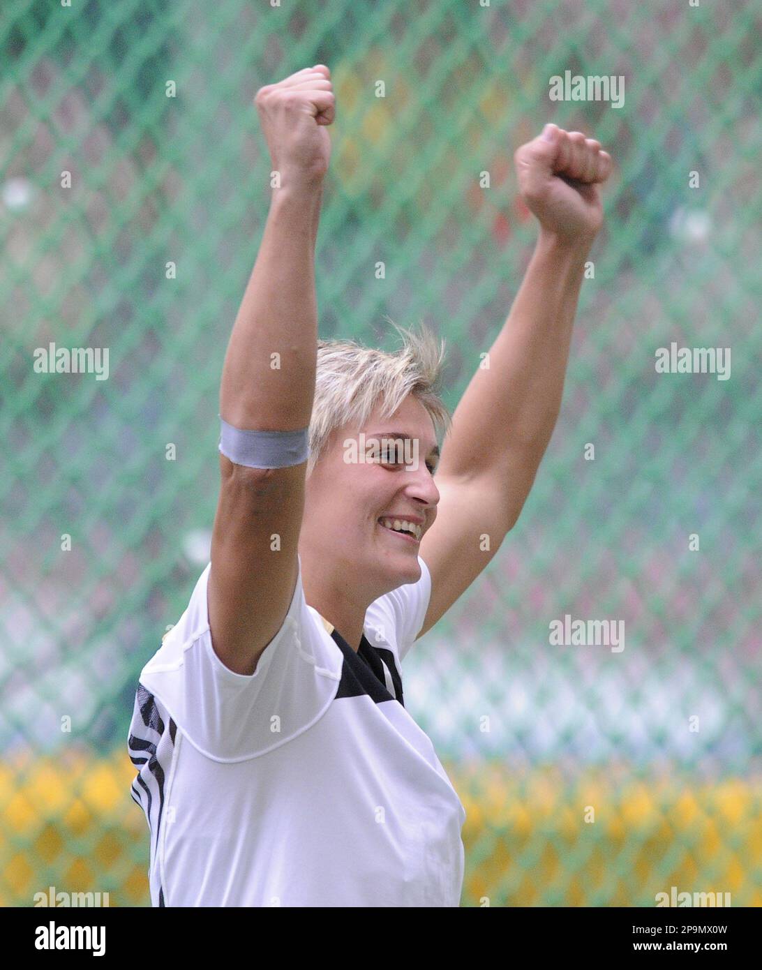 Barbora Spotakova from Czech Republic celebrates after she threw a new