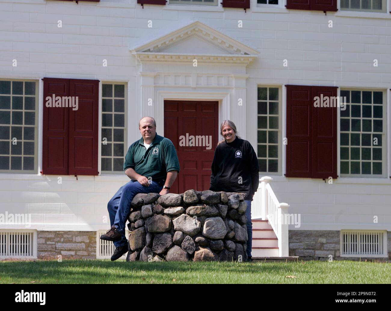 Former curator Wade Wells, left, and site manager Wanda Burch, pose in