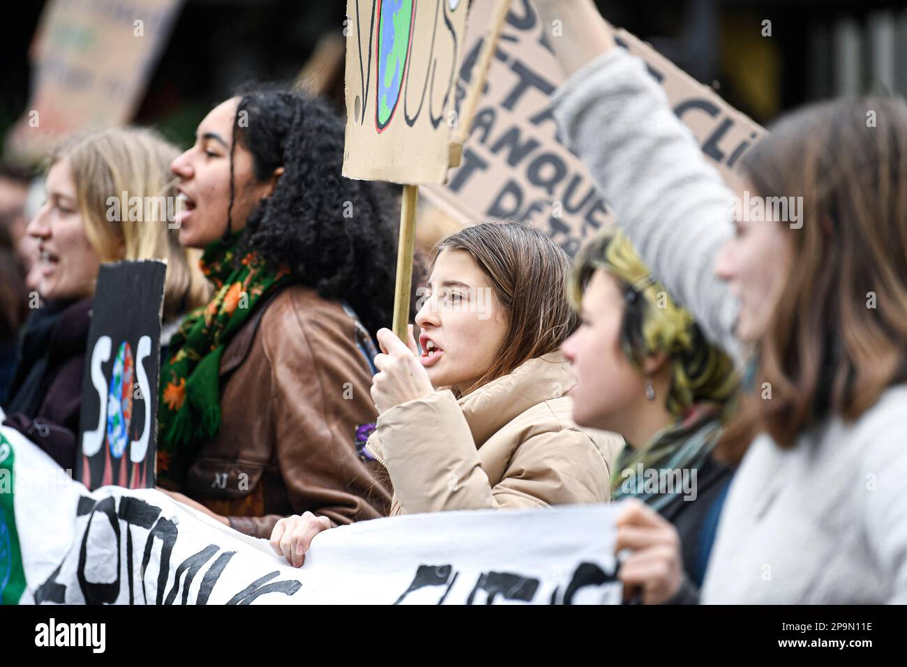 Paris, France. 10th Mar, 2023. Young demonstrators and activists hold up banners and placards during a demonstration for climate and against global warming, organized by the youth movement, 'Fridays for Future' (FFF) on March 10, 2023 in Paris, France. Photo by Victor Joly/ABACAPRESS.COM Credit: Abaca Press/Alamy Live News Stock Photo