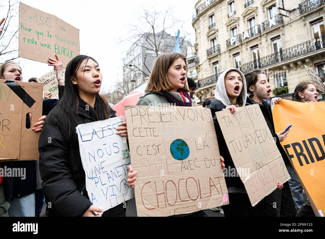 Paris, France. 10th Mar, 2023. Young demonstrators and activists hold up banners and placards during a demonstration for climate and against global warming, organized by the youth movement, 'Fridays for Future' (FFF) on March 10, 2023 in Paris, France. Photo by Victor Joly/ABACAPRESS.COM Credit: Abaca Press/Alamy Live News Stock Photo