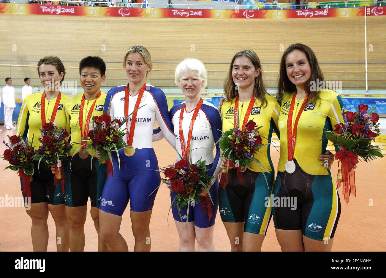 Gold Medalist Britain's Aileen McGlynn, 3rd right, with her pilot Ellen