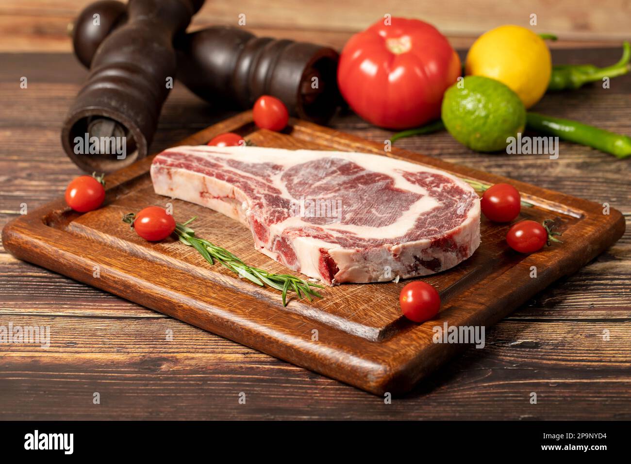 Veal chop. Fresh beef raw thick ribs with spices and rosemary. Special