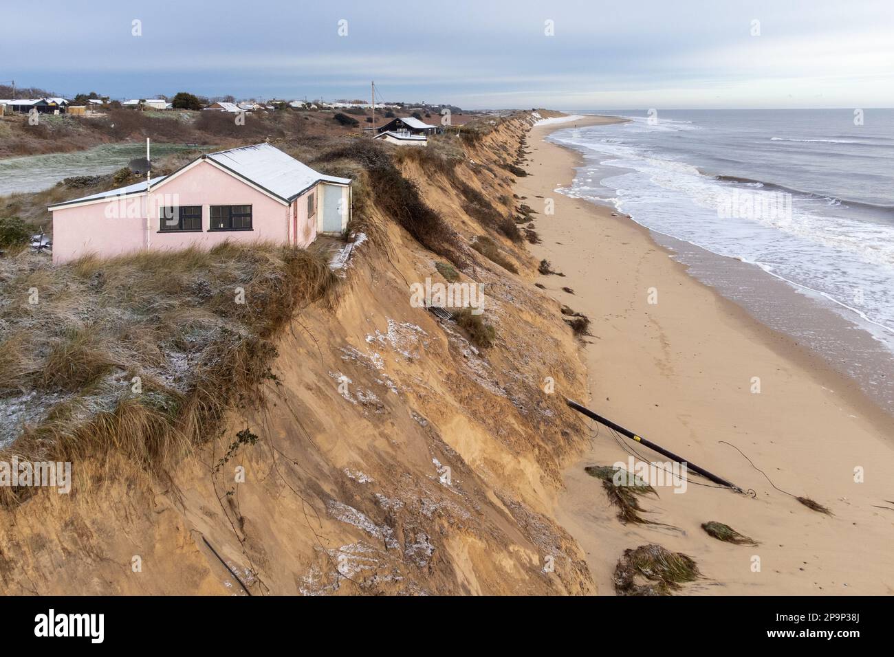 Houses close to the cliff edge at Hemsby in Norfolk, where a number of