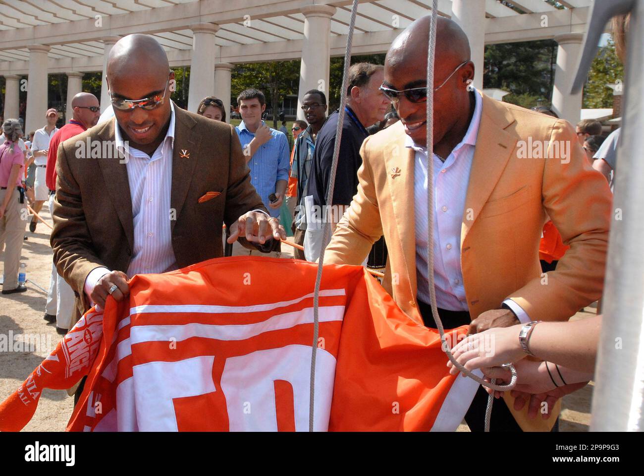 Former University of Virginia twin football stars Tiki Barber