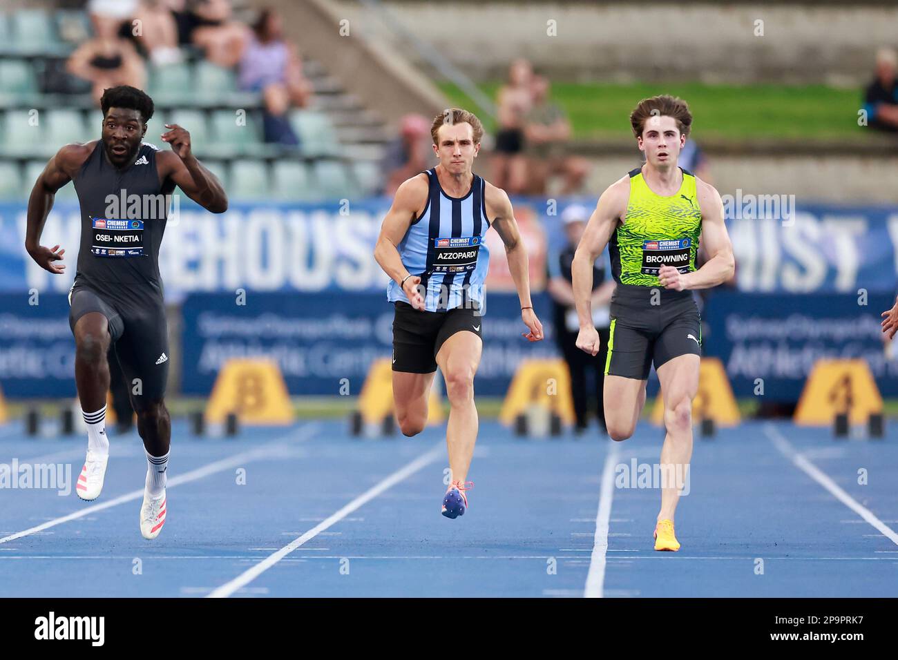 Rohan Browning of Australia (R), wins the Men 100 metresduring the 2023