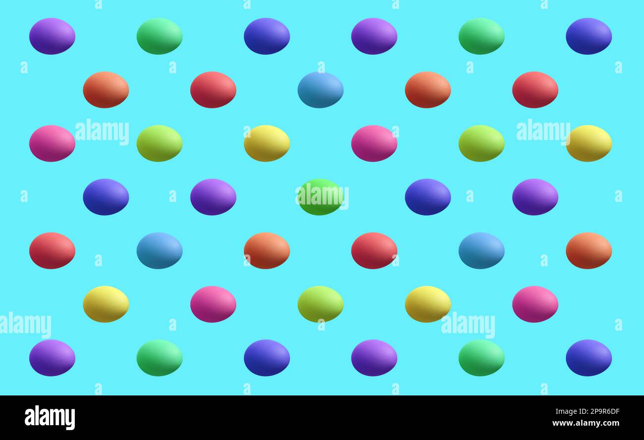 Rainbow Colored Easter Egg Pattern on Arctic Blue Background Stock Photo