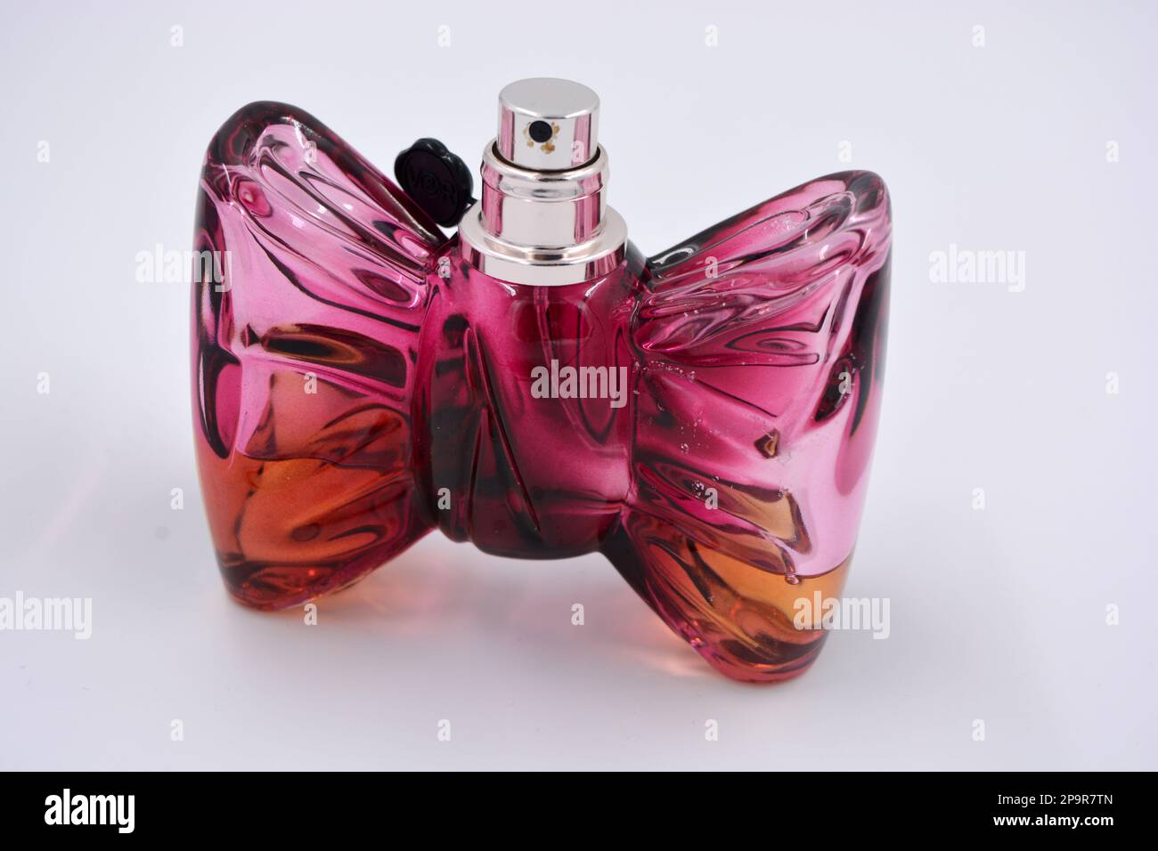 Perfume in bow shaped bottle sales