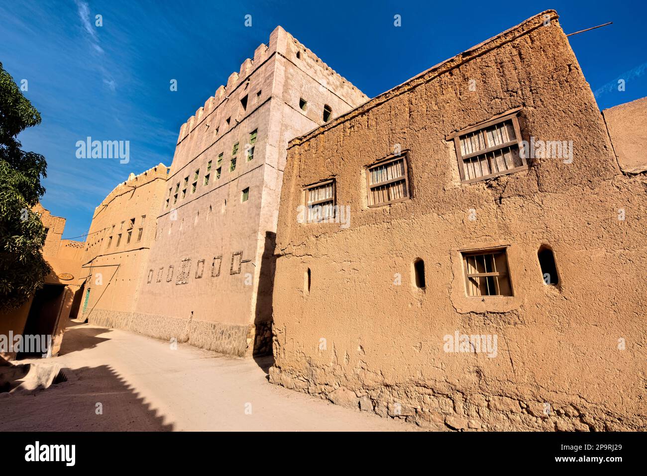 Traditional Bait al Safah old house and living museum amongst the ruins in Al Hamra, Oman Stock Photo