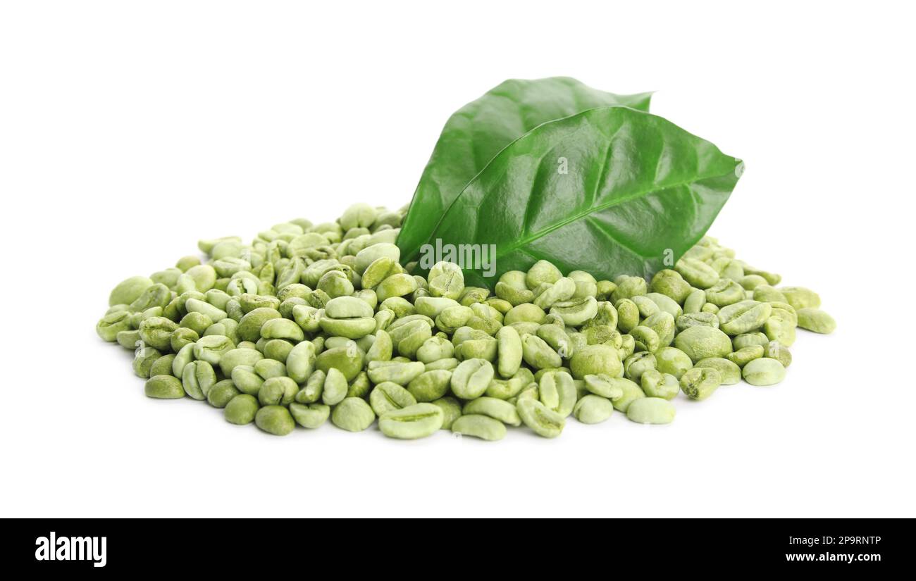 Green coffee beans and fresh leaves on white background Stock Photo - Alamy