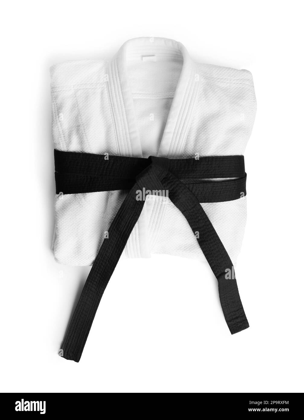 Martial arts uniform with black belt on white background, top view