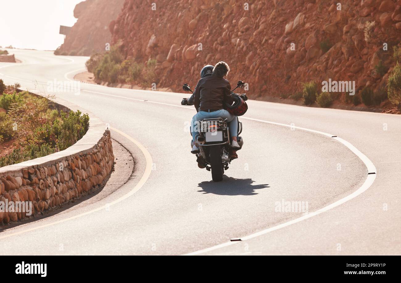 Motorcycle, travel and couple on mountain for adventure, freedom and