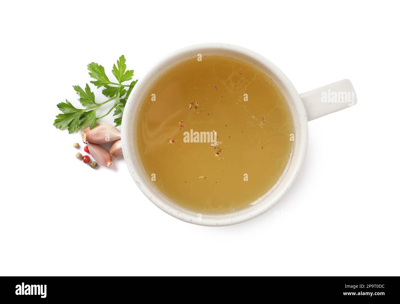 https://c8.alamy.com/comp/2P9T0DC/hot-delicious-bouillon-in-cup-and-ingredients-on-white-background-top-view-2P9T0DC.jpg