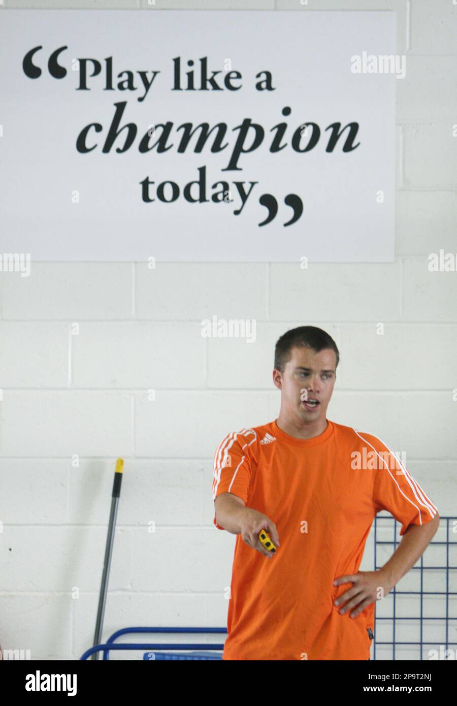 Swimming coach Tom Yetter instructs swimmers at the North Baltimore ...