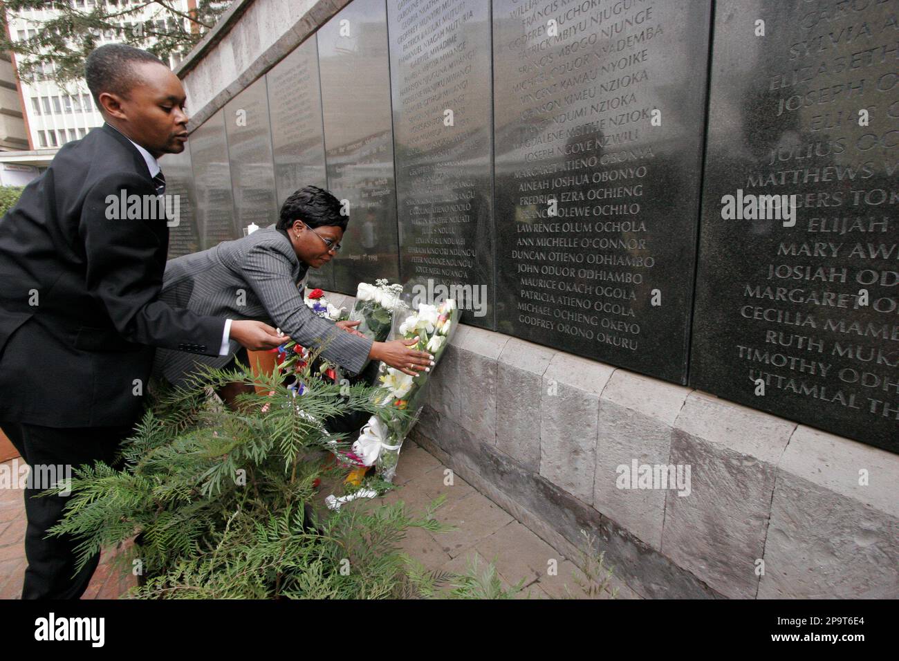 Kenyan's lay flowers at the memorial for victims of the U.S embassy