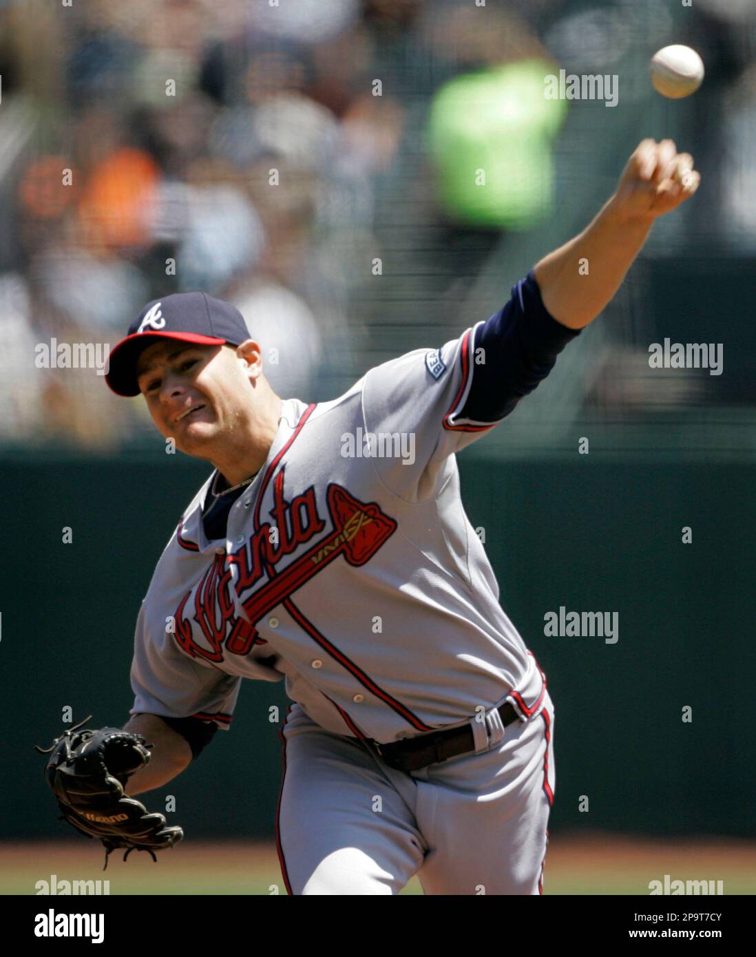 Atlanta Braves starting pitcher Chuck James, front, reacts as