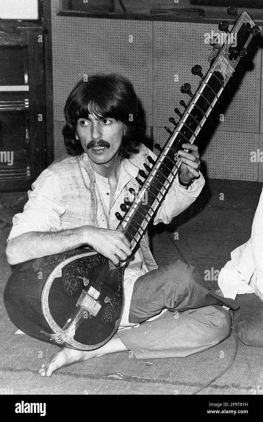 ** FILE ** Harrison, lead guitarist for the British rock and