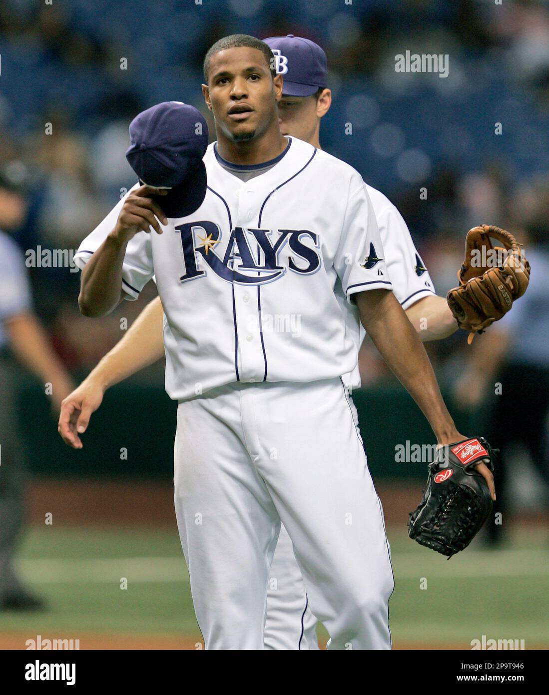 Tampa Bay Rays pitcher Edwin Jackson tips his hat as he leaves the ...