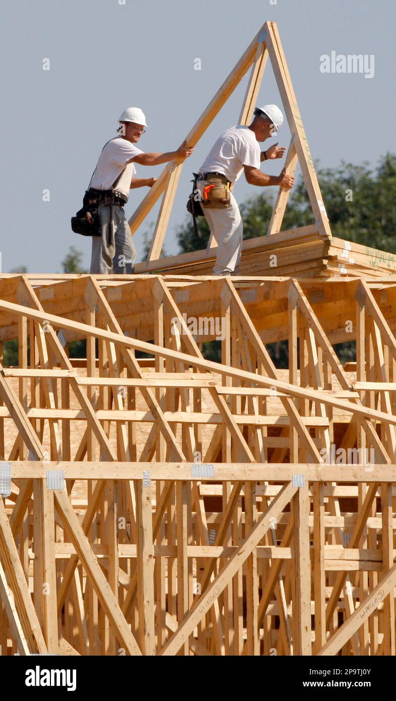 Construction workers working on the framing of new senior living
