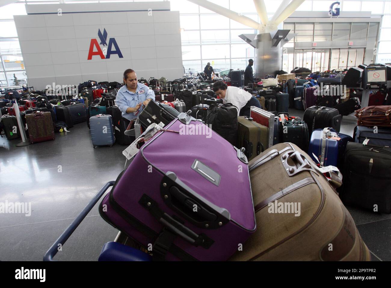Luggage is sorted inside Terminal 8 at JFK International Airport in New
