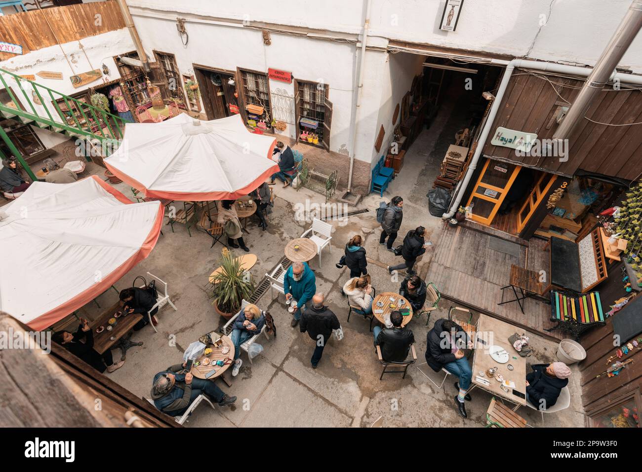 Ankara-Turkey, February 25, 2023: People visiting the various art workshops or sitting in the cafes in Ankara Kaleici, old settlement area inside Anka Stock Photo