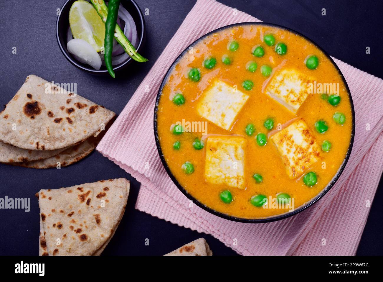 Matar paneer with tawa roti and salad, peas and cottage cheese curry Stock Photo