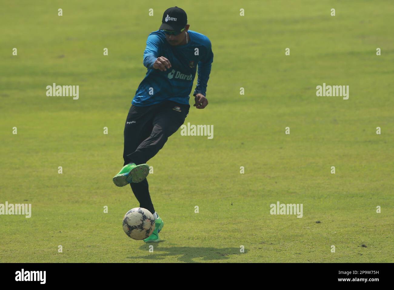 Nasum Ahmed plays football as Bangladesh T20 Cricket Team attends practice ahead of the second match of the series at Sher-e Bangla National Cricket S Stock Photo