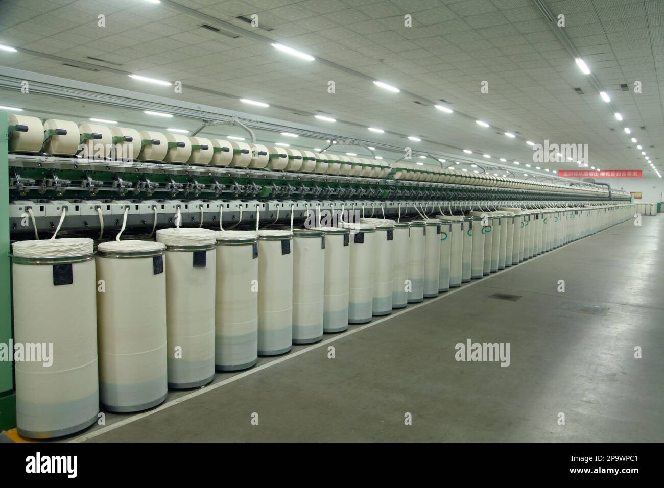 Cotton group in spinning production line factory Stock Photo Alamy