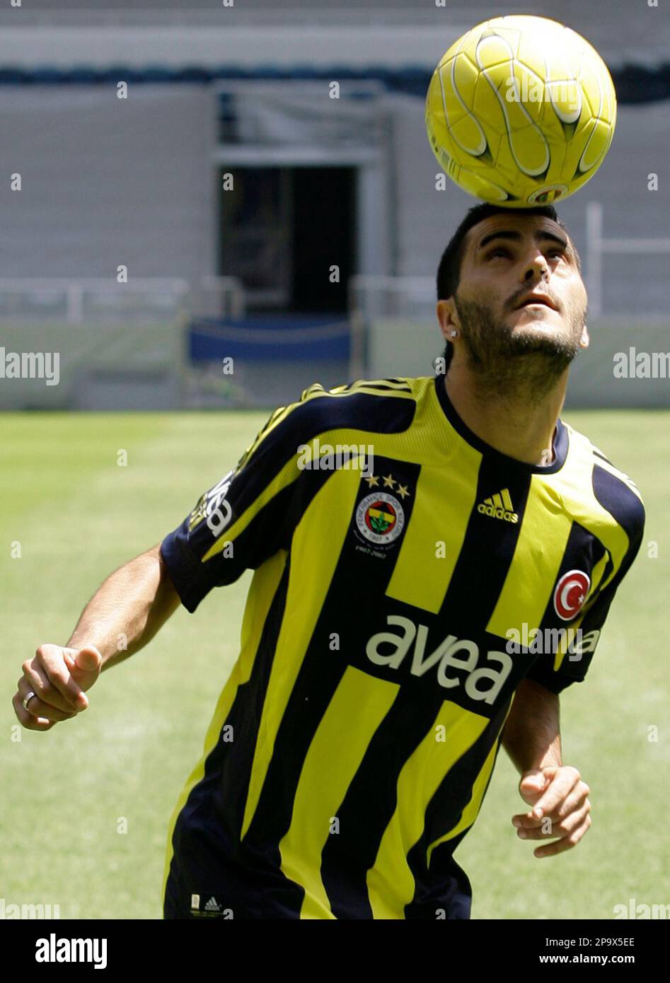 Soccer Star Daniel Guiza Of Spain Poses For Cameras After He Signed A Soccer Star Daniel Guiza Of Spain Poses For Cameras After He Signed A
