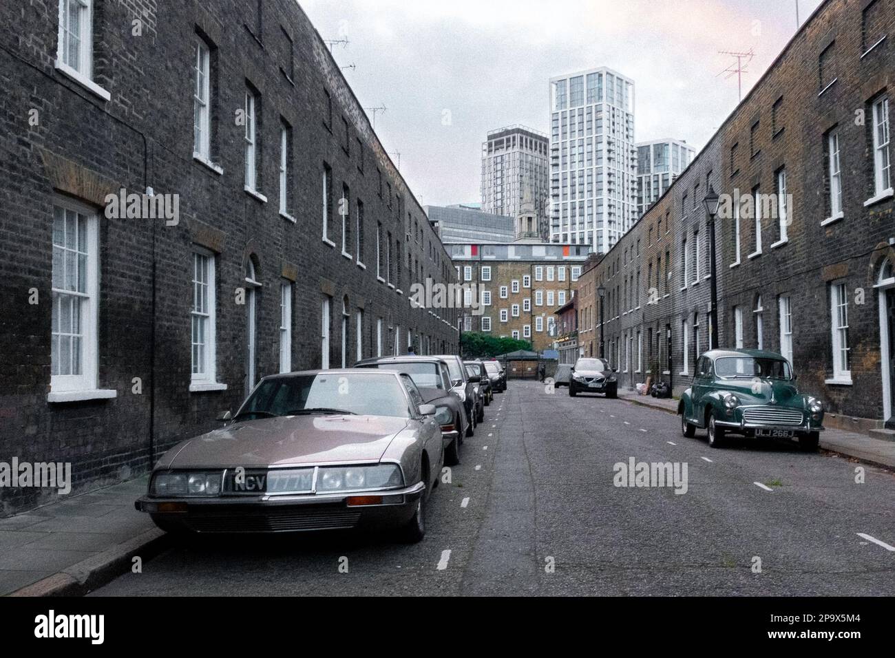 Old London with vintage and old cars on Whittlesey Street, London, UK