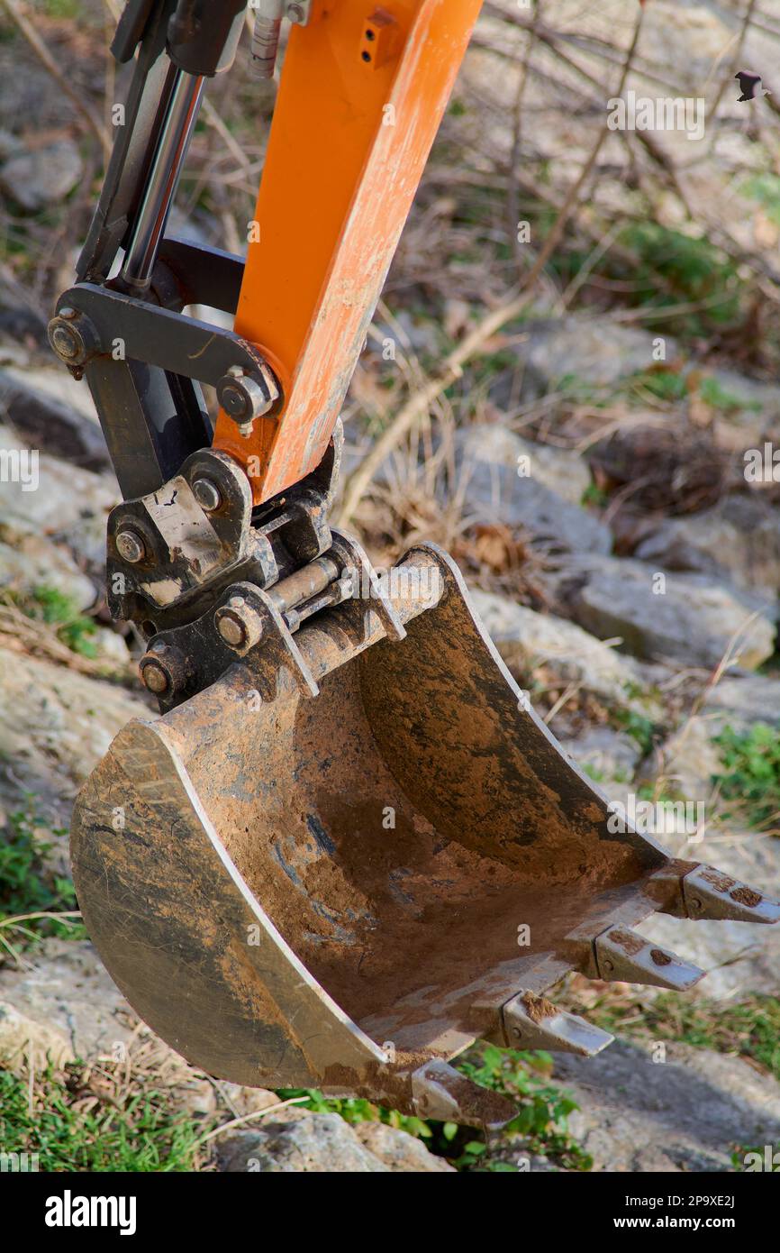 Industrial background. Digger bucket closeup. Construction excavator