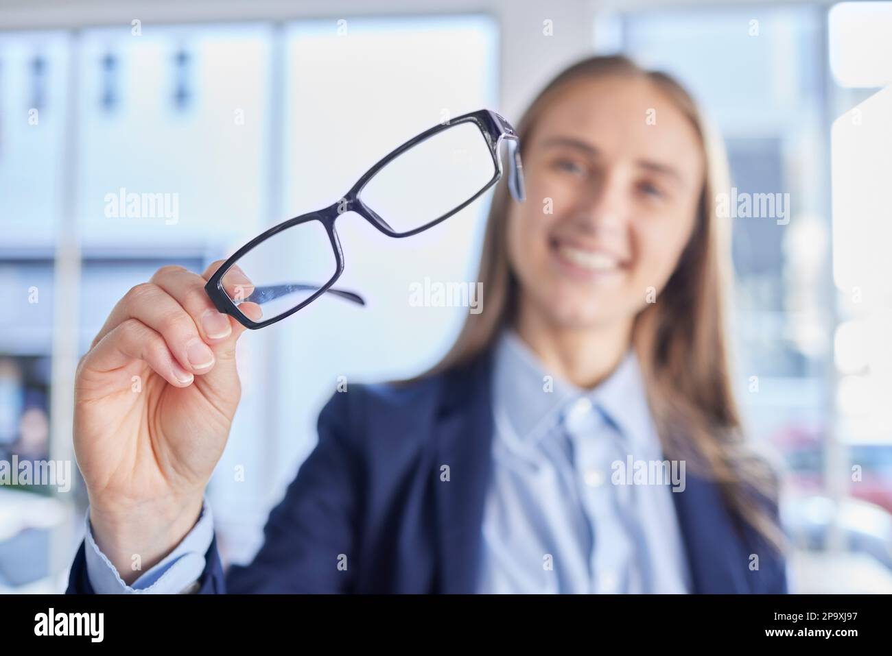 Optometry, eyesight and portrait of woman with spectacles with prescription lens after eye test. Healthcare, vision and female patient or customer Stock Photo