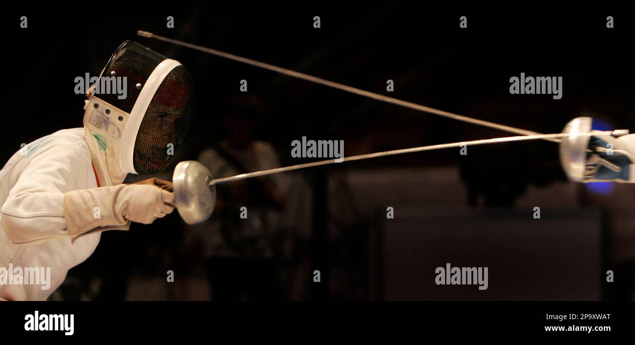 Sophie Lamon of Switzerand, left, fights with Hajnalk Kiraly Picot of