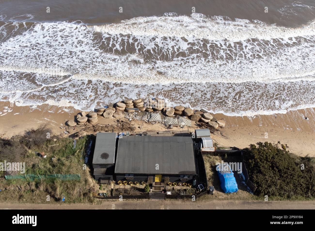 Lance Martin's house on the cliff edge at Hemsby in Norfolk, where a ...